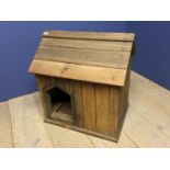 Small pine dog kennel with hinged floor