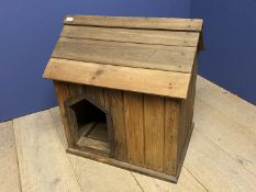 Small pine dog kennel with hinged floor
