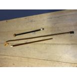 3 walking sticks to include adjustable metal one, a shepherds crook CONDTION: general wear