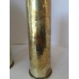 Near pair of WW1 brass shell cases, German, engraved with Egyptian funerary scenes and a large