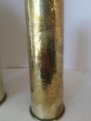 Near pair of WW1 brass shell cases, German, engraved with Egyptian funerary scenes and a large