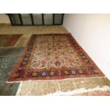 Traditional Old Persian carpet, oatmeal ground central panel with all over stylised floral pattern