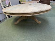Good quality bleached hardwood circular table on a central pedestal. 200 cm diameter. (Condition -