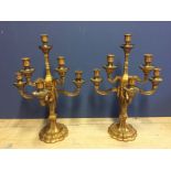 A pair of good quality C19th giltwood side candelabra and a pair of ormolu candle sticks, and qty of