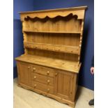 Pine dresser, 3 drawers to base flanked by two cupboards, 83cm H base, plus 110 cm H top x 156cm W x