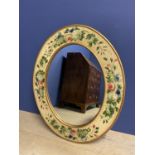 Oval mirror with decorated flowers