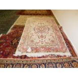 Fine Tabriz silk hand knotted rug, cream central panel and pink medallion and border with all over