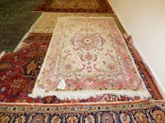 Fine Tabriz silk hand knotted rug, cream central panel and pink medallion and border with all over