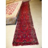 Old traditional red ground Turkey runner with all over stylised pattern. 500 x 94. Condition