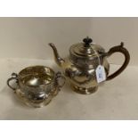 Hallmarked silver tea pot and two handled basin, the bodies embossed with ribbon and swags