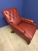 Howard and Sons armchair upholstered in embossed red leather, black leaf and flower pattern on