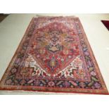 Large Persian rug with 4 center medallions & blue border 207x295cm