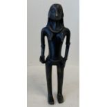 Antique punu tribal bronze figure of a lady wearing a slim belt and necklace carrying a small