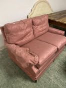 Pink 2 seater sofa. wear and staining