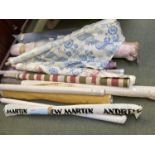 Rolls of surplus fabric, to include Colefax, Andrew Martin, approx 15 rolls.