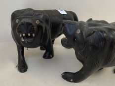 2 19th century African sculptures of lions with ivory eyes and claws, 17cmL