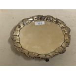 Hallmarked silver small circular salver/waiter with gadrooned and scallop edges on 3 feet, 20cm