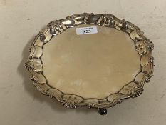 Hallmarked silver small circular salver/waiter with gadrooned and scallop edges on 3 feet, 20cm