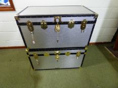 Two large Mossman silver aluminium trunks, differing finish/grain to both (both with keys), 91cm
