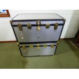 Two large Mossman silver aluminium trunks, differing finish/grain to both (both with keys), 91cm