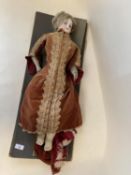 Vintage doll - porcelain head, leather legs, and period dress (condition - some general wear - see