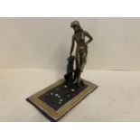 Cold cast bronze of a nude lady with leopard a foot, standing on a rug, 17cmH