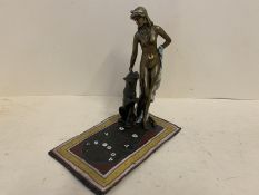Cold cast bronze of a nude lady with leopard a foot, standing on a rug, 17cmH