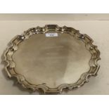 Modern, Asprey, Hallmarked silver circular engraved salver on three feet, , with gadrooned edges,