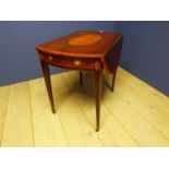 Georgian fiddleback mahogany oval Pembroke table with pull out drawer supported by slender sabre