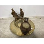 Islamic beaten copper table top tray, a modern barometer, straw work style sculpture of two ethnic
