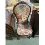 Victorian mahogany show frame nursing chair, upholstered in needlepoint, 104cmH