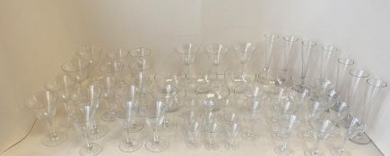Quantity of stemmed cut glass, including fine etched pattern wine glasses and 8 glass bowls (