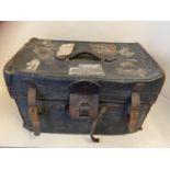 A vintage leather trunk, containing old newspapers from the 1800s. Condition all very worn