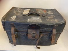 A vintage leather trunk, containing old newspapers from the 1800s. Condition all very worn