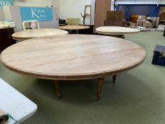 Good quality bleached hardwood circular table on a central pedestal. 296 cm diameter approx. (