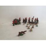 Models of fox, hounds & huntsman and some drums CONDITION: some damage
