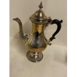 Hallmarked silver coffee pot with fluted foot and lid with acanthus spout, 30cmH, crest engraved,