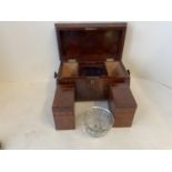 Early Regency mahogany tea caddy supported by bun feet