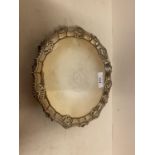Hallmarked silver small circular salver/waiter with gadrooned and scallop edges on 3 feet, engraved,