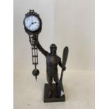 Mystery clock, supported by a pilot holding a propellor, 38cmH, Condition is ok