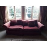 Pair of good quality large 4 seater sofas, retailed by "SofaSofa ". Red fabric oose covers