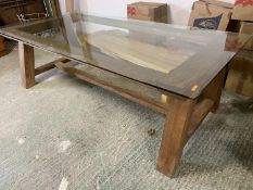 A very good quality, solid oak dining table, with glass top. The heavy oak frame consisting of A