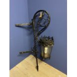 External Victorian iron lamp with ornate wall bracket, converted to electricity, approx 115cmH