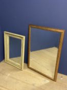 A modern bevelled oblong wall mirror in a modern gilt frame 89 x59cm and a modern cream painted