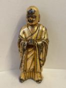 A Chinese gilt bronze figure of a standing monk 10 cm H