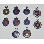 Cricket medals 1927-1938. Nine metal silver hallmarked cricket medals, each with enamel