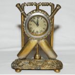 Cricket clock. A Victorian brass mantel clock. The case in the form of a set of stumps with