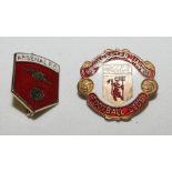 Manchester United. Metal and enamel pin badge in red, white and gold by W. Reeves & Co of
