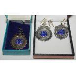 Silver cricket medals. Three silver cricket medals with blue enamel decoration, each awarded to
