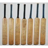 Signed cricket bats. Four miniature cricket bats, each signed by Yorkshire and an opposing teams